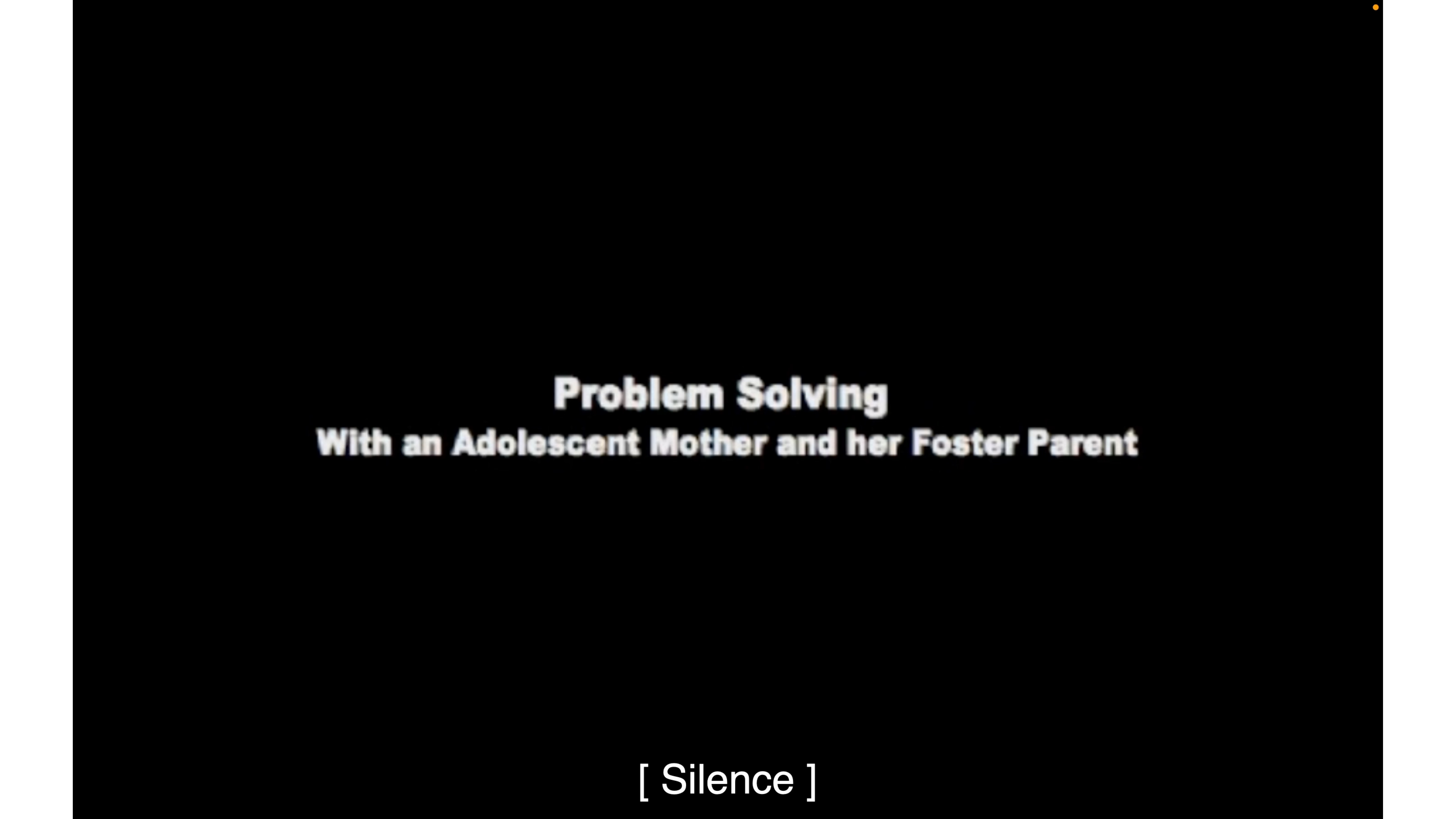 A black presentation slide displays white text reading, 'Problem Solving With an Adolescent Mother and her Foster Parent.' Below is a caption: '[Silence]'.