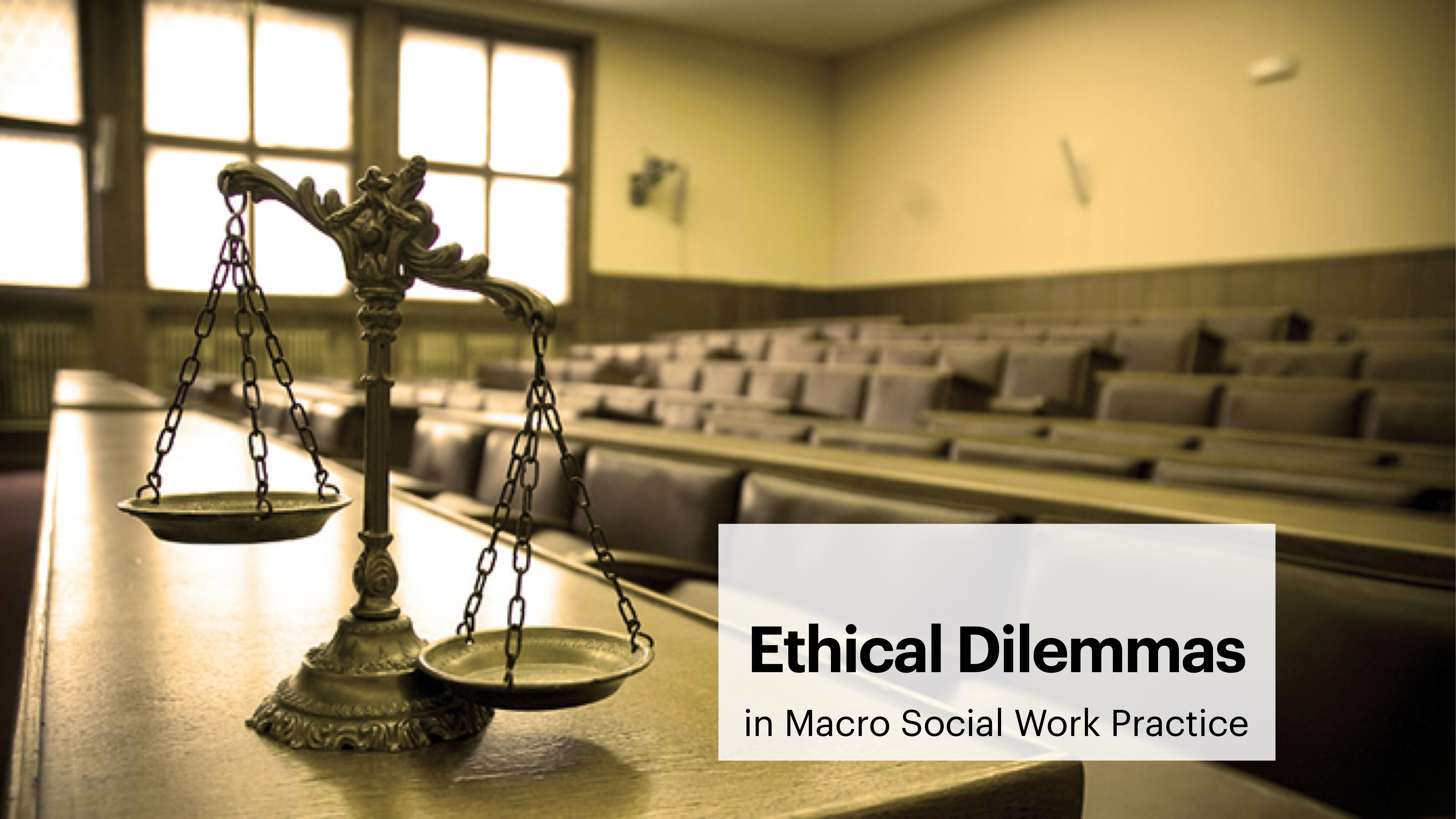 Scales of justice rest on a wooden table in an empty courtroom. Text: 'Ethical Dilemmas in Macro Social Work Practice.'